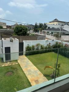 Κήπος έξω από το L' Oasis marine