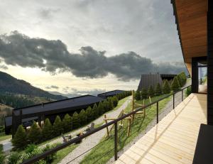 a view from the balcony of a building with trees at Emshir Villas in Krasnik
