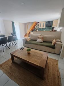 Et opholdsområde på Jolie Maison au 34 centre-ville