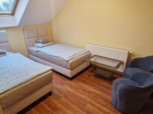 Posezení v ubytování Prywatny Dom z Parkingiem Trzy Sypialnie Self check-in Faktura + 51 fotografií