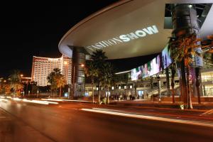 a view of a building at night with a street at Treasure Island - TI Las Vegas Hotel & Casino, a Radisson Hotel in Las Vegas
