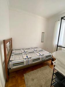 Postel nebo postele na pokoji v ubytování Casa Campos Centro - Perto de Tudo! + 11 fotografií