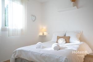 Postel nebo postele na pokoji v ubytování Villa Les Papillons Haven of Peace and Comfort + 71 fotografií