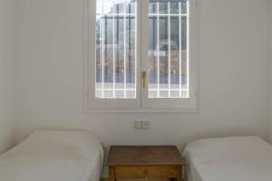 Ένα ή περισσότερα κρεβάτια σε δωμάτιο στο 2 bedroom apartment in Aiguafreda Begur. Sea views terrace and pool Ref:H11