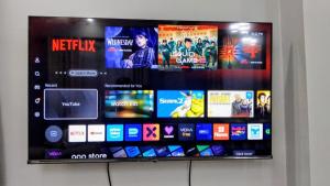 TV a/nebo společenská místnost v ubytování Arusha StayScape + 5 fotografií