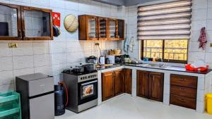 Kuchyň nebo kuchyňský kout v ubytování Arusha StayScape