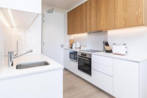 Kuchyň nebo kuchyňský kout v ubytování The Beach House Hout Bay