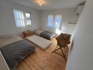 Ένα ή περισσότερα κρεβάτια σε δωμάτιο στο papan room