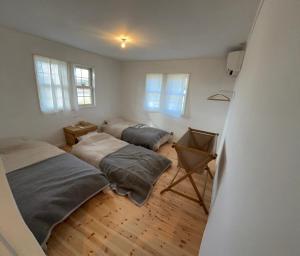 Ένα ή περισσότερα κρεβάτια σε δωμάτιο στο papan room