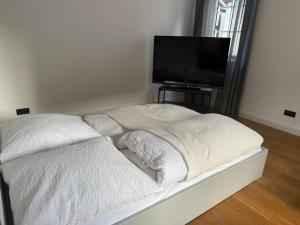 Postel nebo postele na pokoji v ubytování Rosenbalkon