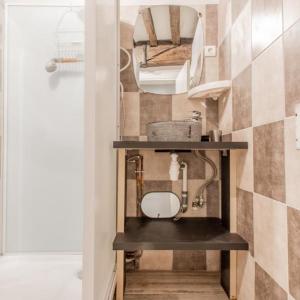 Koupelna v ubytování Arhomeplus-hunic