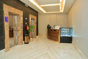 Lobi atau kawasan kaunter penerimaan di سماية للشقق الفندقية