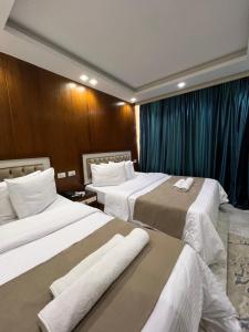 Postel nebo postele na pokoji v ubytování City Sun Cairo Hotel