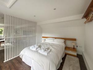 Postel nebo postele na pokoji v ubytování Shepherds Loft