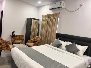 Ένα ή περισσότερα κρεβάτια σε δωμάτιο στο Townhouse Financial District Circle Hyderabad