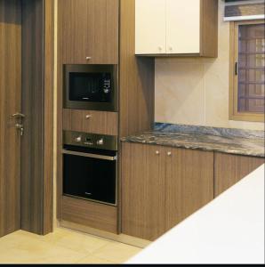 Kuchyň nebo kuchyňský kout v ubytování Valintina apartment wuse ll