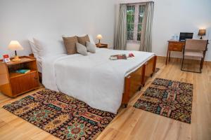 Ένα ή περισσότερα κρεβάτια σε δωμάτιο στο amã Stays & Trails - Hathikuli , Assam