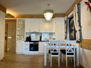 Η κουζίνα ή μικρή κουζίνα στο Tatrzańska Komnata