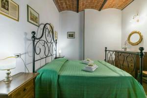 Ένα ή περισσότερα κρεβάτια σε δωμάτιο στο Ground Floor Apartment By Lake Trasimeno +26 φωτογραφίες