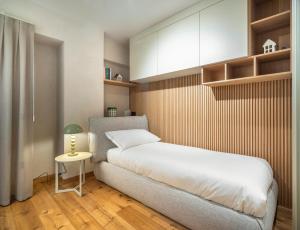 Ένα ή περισσότερα κρεβάτια σε δωμάτιο στο Cademai Alpenglow Chalet with Sauna R&R