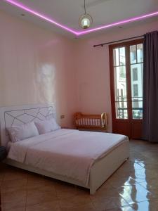 Postel nebo postele na pokoji v ubytování Appartement Néoclassique centre -ville