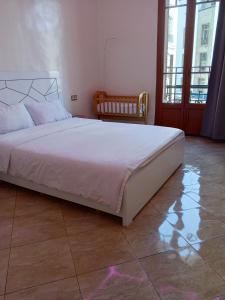 Postel nebo postele na pokoji v ubytování Appartement Néoclassique centre -ville