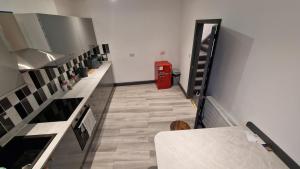 Η κουζίνα ή μικρή κουζίνα στο Bed and Blue by the Beach +10 φωτογραφίες