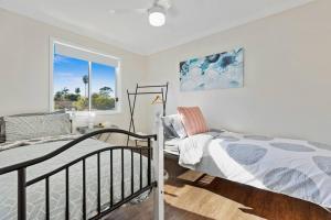 Ένα ή περισσότερα κρεβάτια σε δωμάτιο στο Heated Pool Fireplace Games Room and Pet Friendly +13 φωτογραφίες