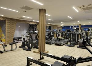 a gym with treadmills and elliptical machines at For Students Only - Student Castle Cambridge in Chesterton