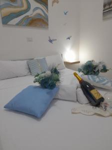 Ένα ή περισσότερα κρεβάτια σε δωμάτιο στο Falanga Family Guests Accommodation