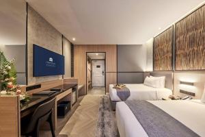 Postel nebo postele na pokoji v ubytování Selfie point hotel restaurant & cafe