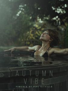 a woman is sitting in a bath tub at Pipi Vityilló in Füzérradvány