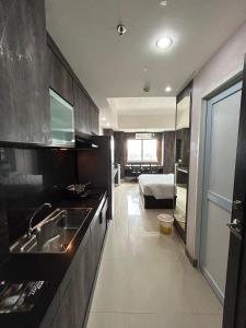 Η κουζίνα ή μικρή κουζίνα στο Nagoya Mansion Residence with City View