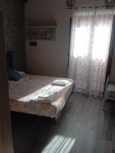 Ένα ή περισσότερα κρεβάτια σε δωμάτιο στο Alla cattedrale home