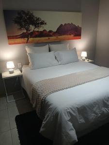 Postel nebo postele na pokoji v ubytování Aeon Guest House & Spa