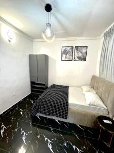 Posezení v ubytování The Apartment at Akoka Yaba, Lagos - House 16 Shobande Street