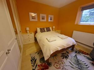 Ένα ή περισσότερα κρεβάτια σε δωμάτιο στο Charming Retreat - Broadstairs Seafront