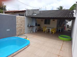 Swimmingpoolen hos eller tæt på Casa Village de Jacumã