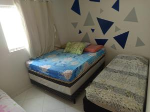 En eller flere senge i et værelse på Casa Village de Jacumã + 12 billeder