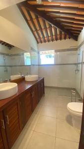 Ένα μπάνιο στο Guest House Brava Buzios