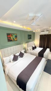 Postel nebo postele na pokoji v ubytování The rudra heritage