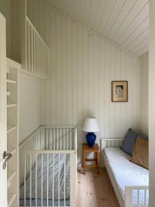 Ένα ή περισσότερα κρεβάτια σε δωμάτιο στο Modern And Idyllic Holiday Home With Forest Views