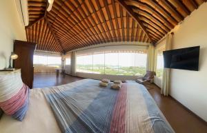 Μια τηλεόραση ή/και κέντρο ψυχαγωγίας στο Guest House Brava Buzios