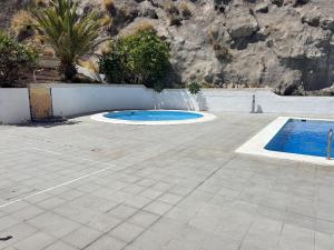 Πισίνα στο ή κοντά στο Dúplex de Lujo Frente al Mar Terraza en Radazul