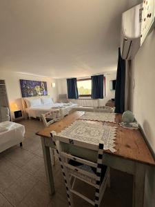 Ένα ή περισσότερα κρεβάτια σε δωμάτιο στο La Casa Di Imma