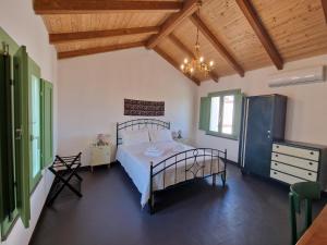 Ένα ή περισσότερα κρεβάτια σε δωμάτιο στο La Casa Vecchia