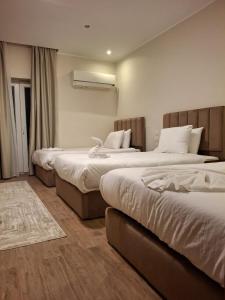 Una cama o camas en una habitación de Giza pYramids hOtel