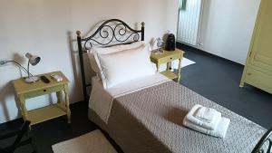 Ένα ή περισσότερα κρεβάτια σε δωμάτιο στο La Casa Vecchia