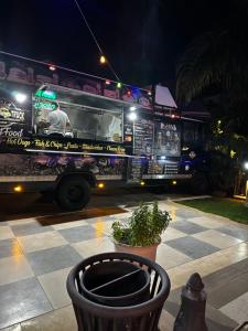 a food truck parked on the street at night at Kıbrıs Girnede 1 yatak odalı Süper lüks havuzlu daire in Vuda