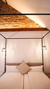 Ένα ή περισσότερα κρεβάτια σε δωμάτιο στο Hotel Fuchs Saarbrücken